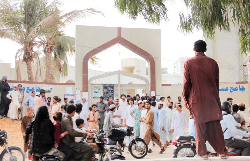 rangers and police officials forced the crowd of worried spectators to disperse as they were hindering rescue efforts photo ayesha mir express