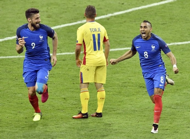 france 039 s forward dimitri payet r celebrates scoring the 2 1 goal with team mate france 039 s forward olivier giroud l next to romania 039 s midfielder gabriel torje during the euro 2016 group a football match between france and romania at stade de france in saint denis north of paris on june 10 2016 photo afp france 039 s forward dimitri payet r celebrates scoring the 2 1 goal with team mate france 039 s forward olivier giroud l next to romania 039 s midfielder gabriel torje during the euro 2016 group a football match between france and romania at stade de france in saint denis north of paris on june 10 2016 photo afp