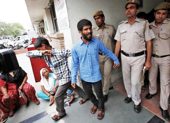 policemen escort men convicted for the gang rape of a danish woman at a court in new delhi india june 9 2016 photo reuters