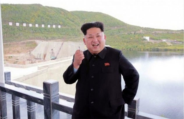 a picture released by the newspaper of the north korea ruling workers party on sept 14 2014 shows north korean leader kim jong un holding a cigarette photo courtesy european pressphoto agency