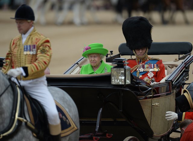 britain 039 s queen elizabeth ii and britain 039 s prince philip duke of edinburgh r arrive in a horse drawn carriage at horse guards parade for the queen 039 s birthday parade 039 trooping the colour 039 in london on june 11 2016 photo afp
