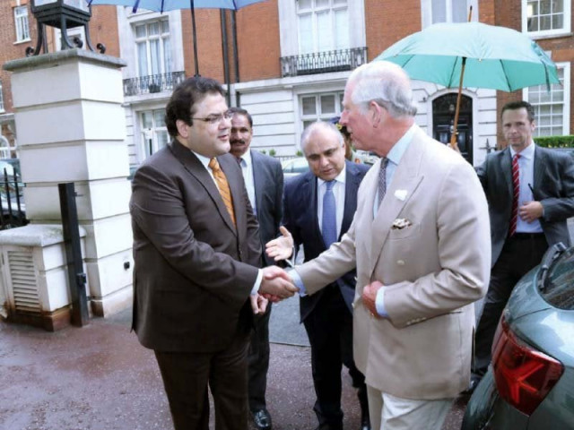 prince charles shakes hands with prime minister nawaz sharif s son hussain nawaz photo naseem siddiqui express
