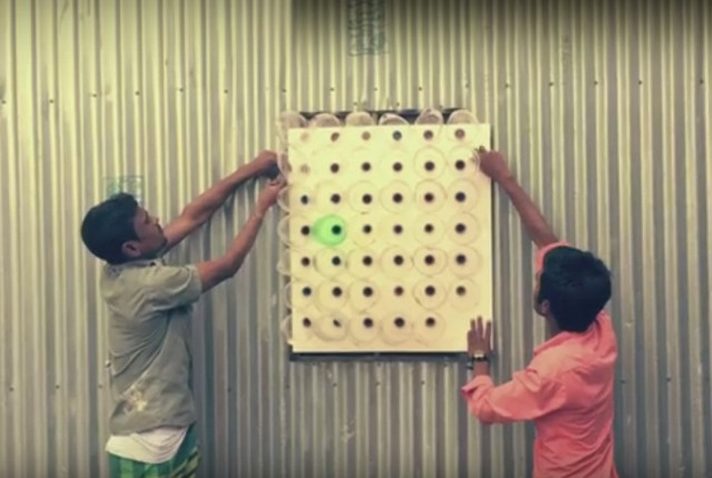 dubbed as the world s first zero electricity air cooler eco cooler uses re purposed plastic bottles cut in half and put into a grid to cool the room dubbed as the world s first zero electricity air cooler eco cooler uses re purposed plastic bottles cut in half and put into a grid to cool the room