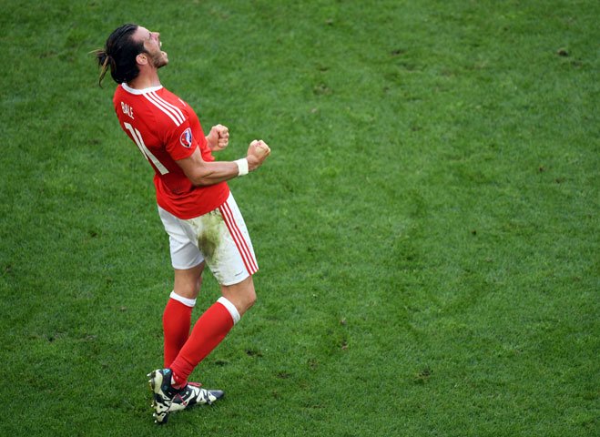 wales 039 forward gareth bale celebrates the team 039 s 2 1 win over slovakia in the euro 2016 group b football match between wales and slovakia at the stade de bordeaux in bordeaux on june 11 2016 photo afp