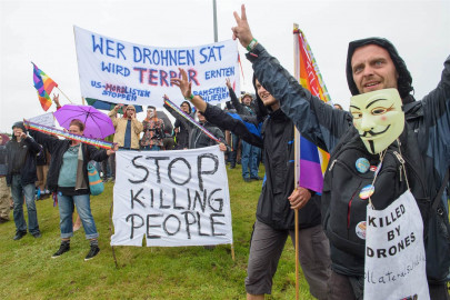 thousands protest against drones at us air force base in germany