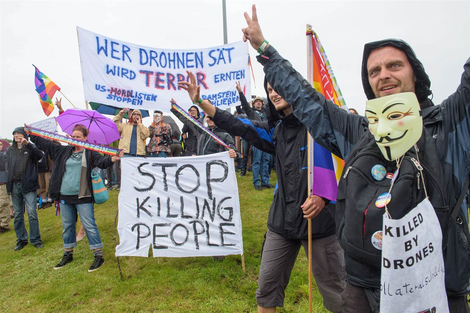 several thousand demonstrators formed a human chain along the perimeter of a us air force base in southwest germany on saturday in protest against drone operations by the united states photo epa