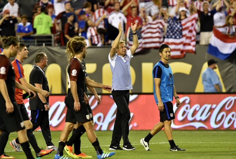 usa 039 s coach jurgen klinsmann acknowledges the crowd after defeating paraguay 1 0 in a copa america centenario football tournament match in philadelphia pennsylvania united states on june 11 2016 photo afp