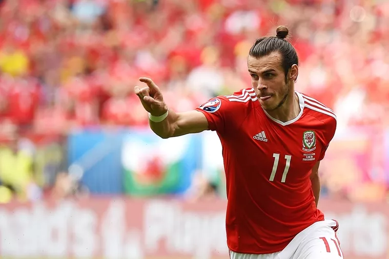 wales 039 forward gareth bale celebrates after scoring the first goal during the euro 2016 group b football match between wales and slovakia at the stade de bordeaux in bordeaux on june 11 2016 photo afp wales 039 forward gareth bale celebrates after scoring the first goal during the euro 2016 group b football match between wales and slovakia at the stade de bordeaux in bordeaux on june 11 2016 photo afp