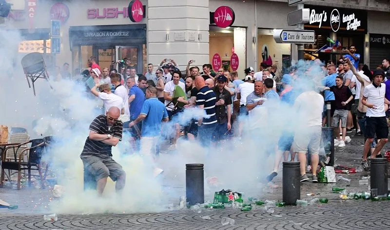 tear gas is released by french police as england fans gather in the port of marseille on june 10 2016 ahead of england 039 s euro 2016 match against russia photo afp tear gas is released by french police as england fans gather in the port of marseille on june 10 2016 ahead of england 039 s euro 2016 match against russia photo afp