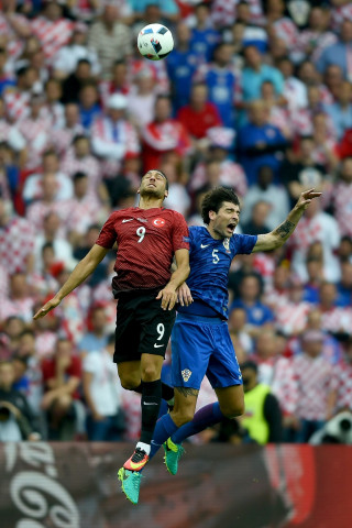 turkey 039 s forward cenk tosun l jumps for the ball against croatia 039 s defender vedran corluka during the euro 2016 group d football match between turkey and croatia at parc des princes in paris on june 12 2016 photo afp turkey 039 s forward cenk tosun l jumps for the ball against croatia 039 s defender vedran corluka during the euro 2016 group d football match between turkey and croatia at parc des princes in paris on june 12 2016 photo afp