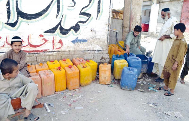 people wait in line to fill water from a tube well in quetta the balochistan government has announced rs10 billion for water supply scheme in the provincial capital photo naseem james express people wait in line to fill water from a tube well in quetta the balochistan government has announced rs10 billion for water supply scheme in the provincial capital photo naseem james express