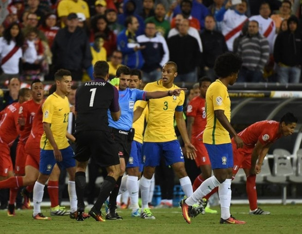 brazilian footballers argue with uruguayan referee andres cunha c as he consults his assistants before awarding a goal to peru during the copa america centenario football tournament in foxborough massachusetts united states on june 12 2016 photo afp brazilian footballers argue with uruguayan referee andres cunha c as he consults his assistants before awarding a goal to peru during the copa america centenario football tournament in foxborough massachusetts united states on june 12 2016 photo afp