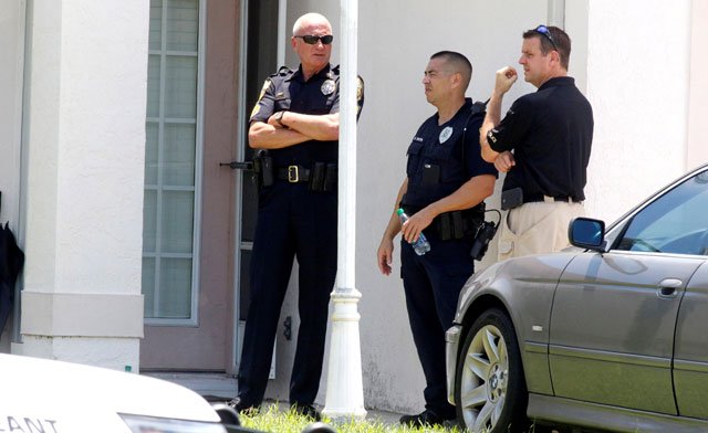 police stand in front of one of the houses that officials indicated was connected to the orlando shooter in port st lucie florida us june 12 2016 photo reuters
