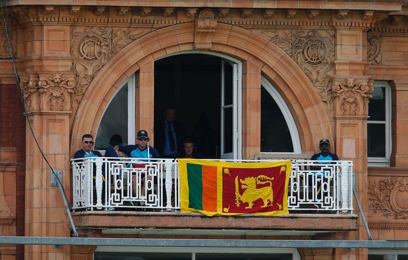 a flag is draped over sri lanka balcony during play on fourth day of third test between england and sri lanka at lord 039 s cricket ground in london on june 12 2016 photo afp