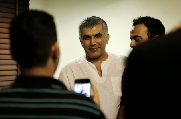 bahraini human rights activist nabeel rajab c is greeted by relatives at his home in the village of bani jamrah on july 14 2015 after his release from prison photo afp file