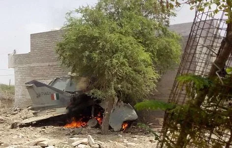 two houses were also damaged as the aircraft on its routine training mission crashed in jodhpur photo courtesy ani asian news international two houses were also damaged as the aircraft on its routine training mission crashed in jodhpur photo courtesy ani asian news international