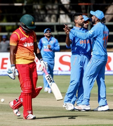 india bowler dhawal kulkarni 2 r celebrates the wicket of zimbabwe 039 s chamunorwa chibhabha l with teammate k l rahul during the second one day international odi cricket match between india and hosts zimbabwe at the harare sports club zimbabwe june 13 2016 photo afp india bowler dhawal kulkarni 2 r celebrates the wicket of zimbabwe 039 s chamunorwa chibhabha l with teammate k l rahul during the second one day international odi cricket match between india and hosts zimbabwe at the harare sports club zimbabwe june 13 2016 photo afp