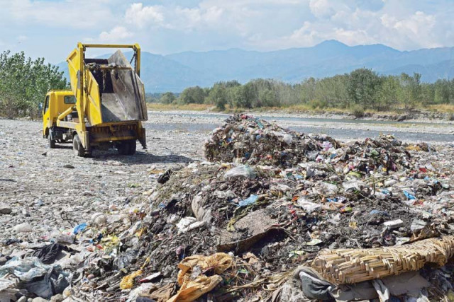 waste dumped along swat river photo express waste dumped along swat river photo express