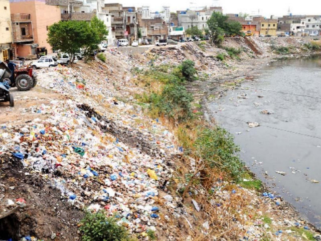 large quantity of waste can be seen dumped at the banks of nullah leh in dhoke chiraghdin area photo agha mehroz express large quantity of waste can be seen dumped at the banks of nullah leh in dhoke chiraghdin area photo agha mehroz express