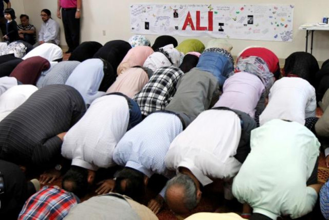 members of the louisville islamic center pray together before an inter faith service to honor muhammad ali the former world heavyweight boxing champion after he died at the age of 74 on friday at the islamic center in louisville kentucky us on june 5 2016 photo reuters members of the louisville islamic center pray together before an inter faith service to honor muhammad ali the former world heavyweight boxing champion after he died at the age of 74 on friday at the islamic center in louisville kentucky us on june 5 2016 photo reuters