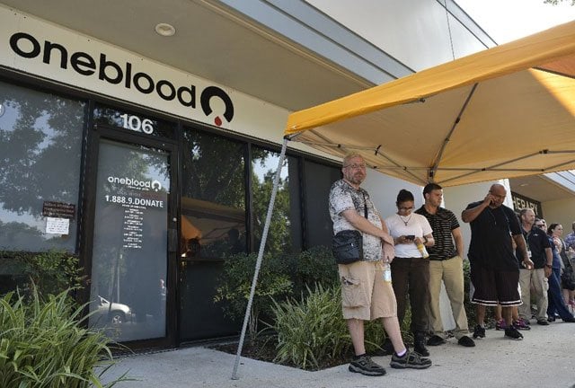 the center teemed with activity monday as volunteers arranged appointments for people who need counseling after the carnage and took delivery of supplies photo afp