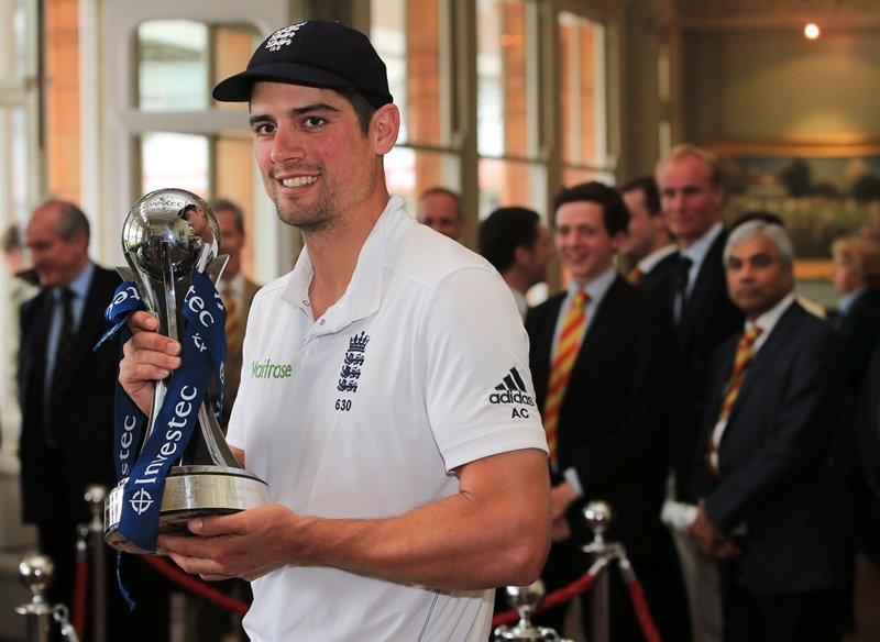 alastair cook poses with investec series trophy at lord 039 s cricket ground in london on june 13 2016 photo afp