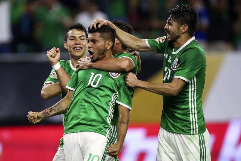 jesus manuel corona number 10 celebrates with teammates after scoring a goal against venezuela photo reuters