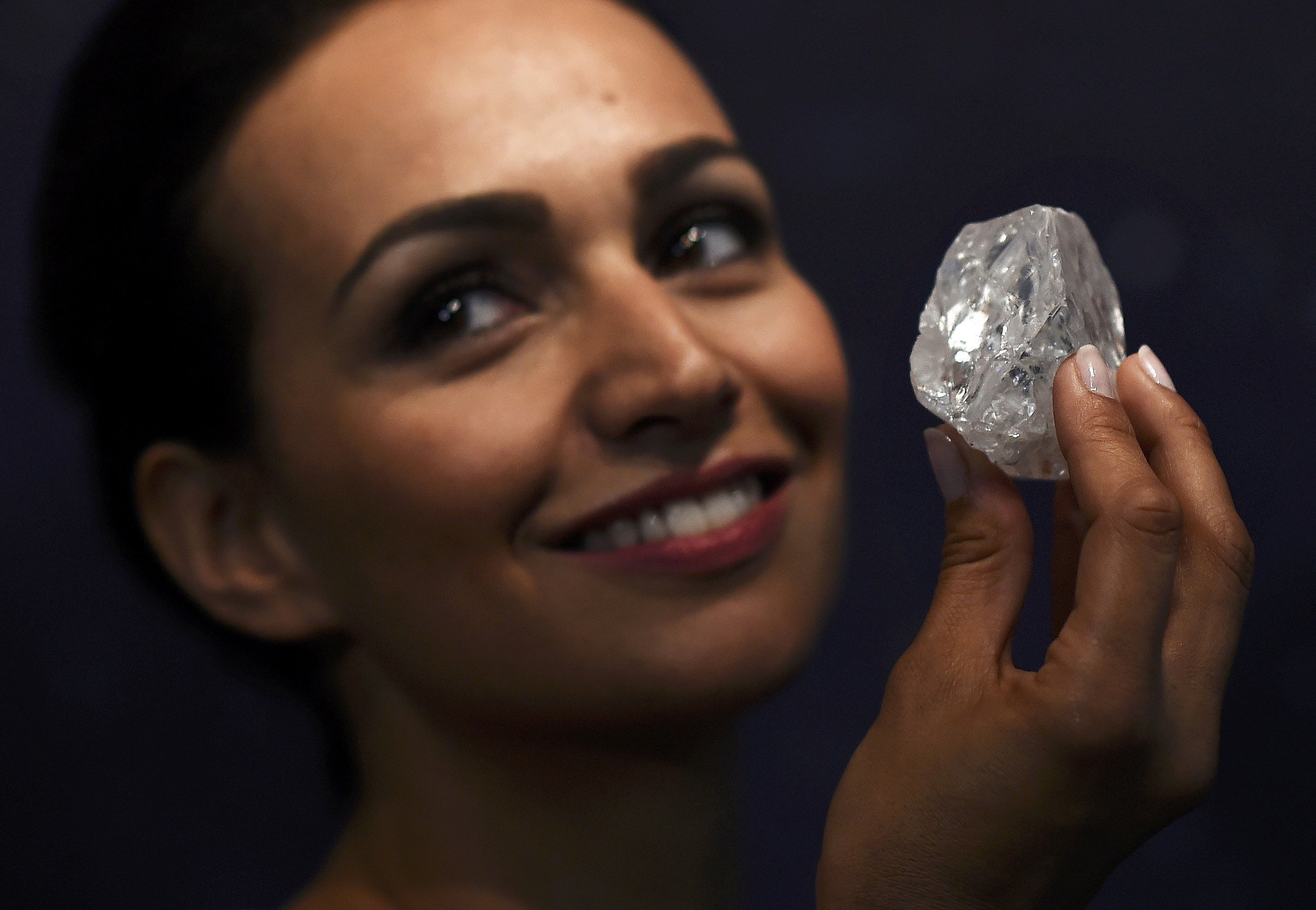 a model shows off the 1109 carat quot lesedi la rona quot the largest gem quality rough diamond discovered in over 100 years during a sale preview at sotheby 039 s auction house in london britain june 14 2016 photo reuters