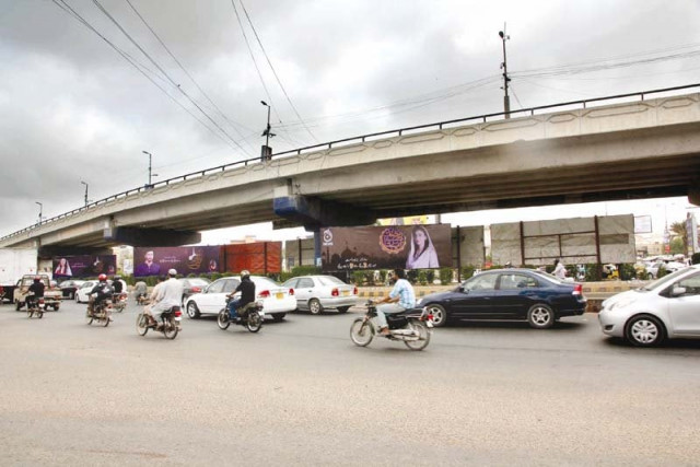 seven new billboards have been installed under the jauhar morr s flyover on rashid minhas road advertising ramazan shows photo athar khan express