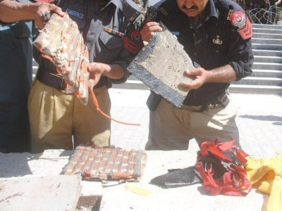 things that go boom suicide vests ammunition found in raid