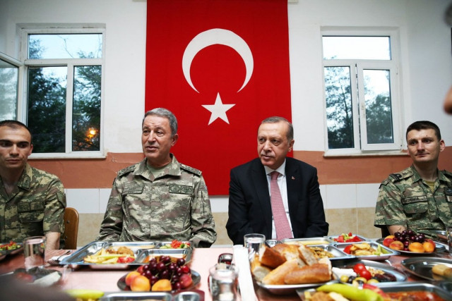 in this photo released by the turkish presidential press office turkish president recep tayyip erdogan sits with soldiers as he breaks his fast at an iftar dinner with the 70th mechanized infantry brigade command in mardin turkey on june 14 2016 photo afp in this photo released by the turkish presidential press office turkish president recep tayyip erdogan sits with soldiers as he breaks his fast at an iftar dinner with the 70th mechanized infantry brigade command in mardin turkey on june 14 2016 photo afp