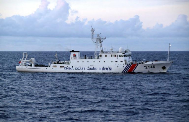 image taken by the japan coast guard shows a chinese coast guard ship cruising near the disputed islets in east china sea photo afp image taken by the japan coast guard shows a chinese coast guard ship cruising near the disputed islets in east china sea photo afp