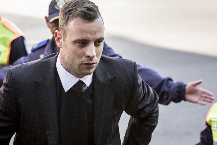 south african paralympic athlete oscar pistorius walks back to the pretoria high court after a lunch break on june 15 2016 during his resentencing hearing for the 2013 murder of his girlfriend reeva steenkamp at the pretoria high court on june 15 2016 a sobbing oscar pistorius walked hesitantly on his stumps around court on june 15 in a dramatic demonstration of his disability ahead of his sentencing for murdering his girlfriend reeva steenkamp photo afp