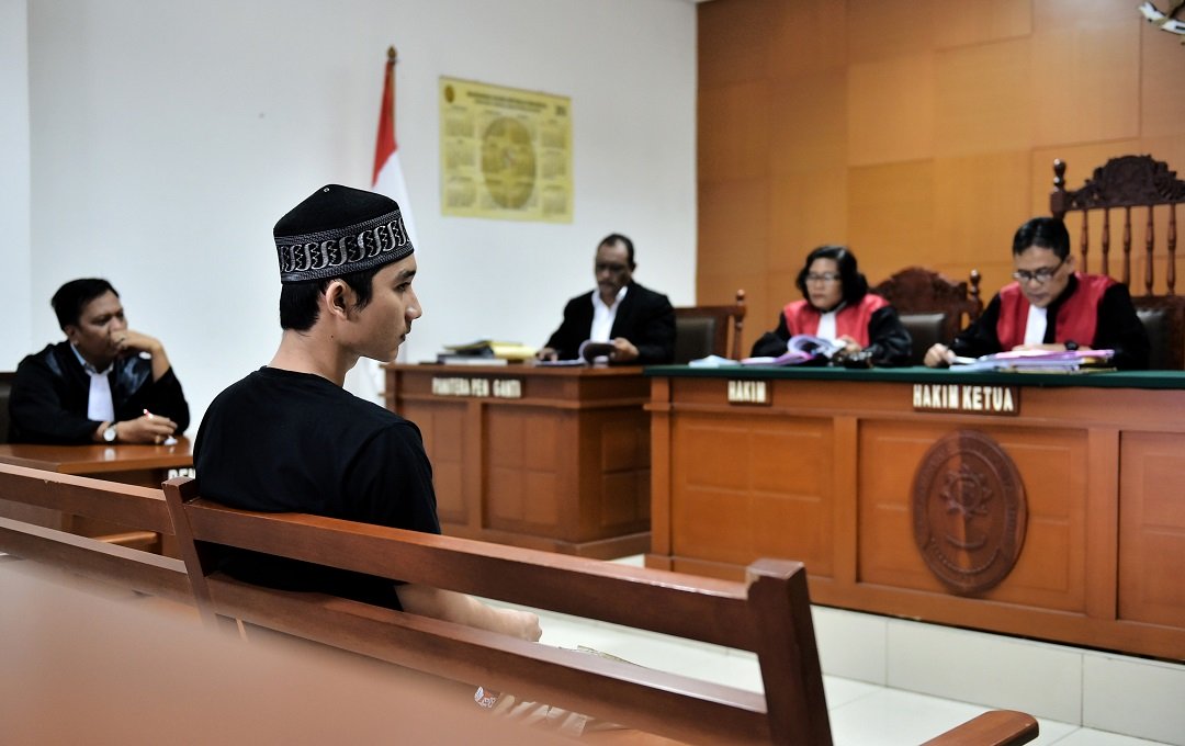 suspected terrorist ibadurrahman 2nd l listens to the judges read out their verdict during his trial in jakarta on june 15 2016 photo afp