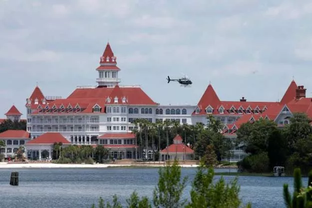 a florida fish and wildlife conservation commission helicopter flies over the seven seas lagoon at walt disney world resort after an alligator dragged a two year old boy into the water in orlando florida june 15 2016 photo reuters a florida fish and wildlife conservation commission helicopter flies over the seven seas lagoon at walt disney world resort after an alligator dragged a two year old boy into the water in orlando florida june 15 2016 photo reuters
