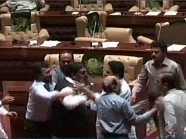 post budget session marred by scuffle between mqm ppp leaders photo express news screengrab