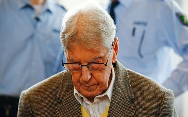 former ss guard reinhold hanning arrives for his trial in detmold photo afp former ss guard reinhold hanning arrives for his trial in detmold photo afp