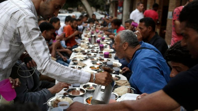 people eat iftar the breaking of fast meal served for free on quot charity tables quot on a street during the first day of the holy month of ramadan in cairo june 29 2014 photo reuters people eat iftar the breaking of fast meal served for free on quot charity tables quot on a street during the first day of the holy month of ramadan in cairo june 29 2014 photo reuters