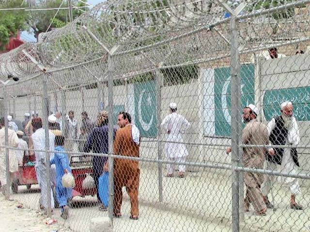 afghan people enter pakistan via torkham border which was closed due to instalation of fences photo inp file