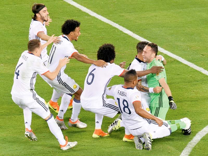 colombia players had their goalkeeper to thank as it was his save which turned the tide of the penalty shoot out in their favour photo afp