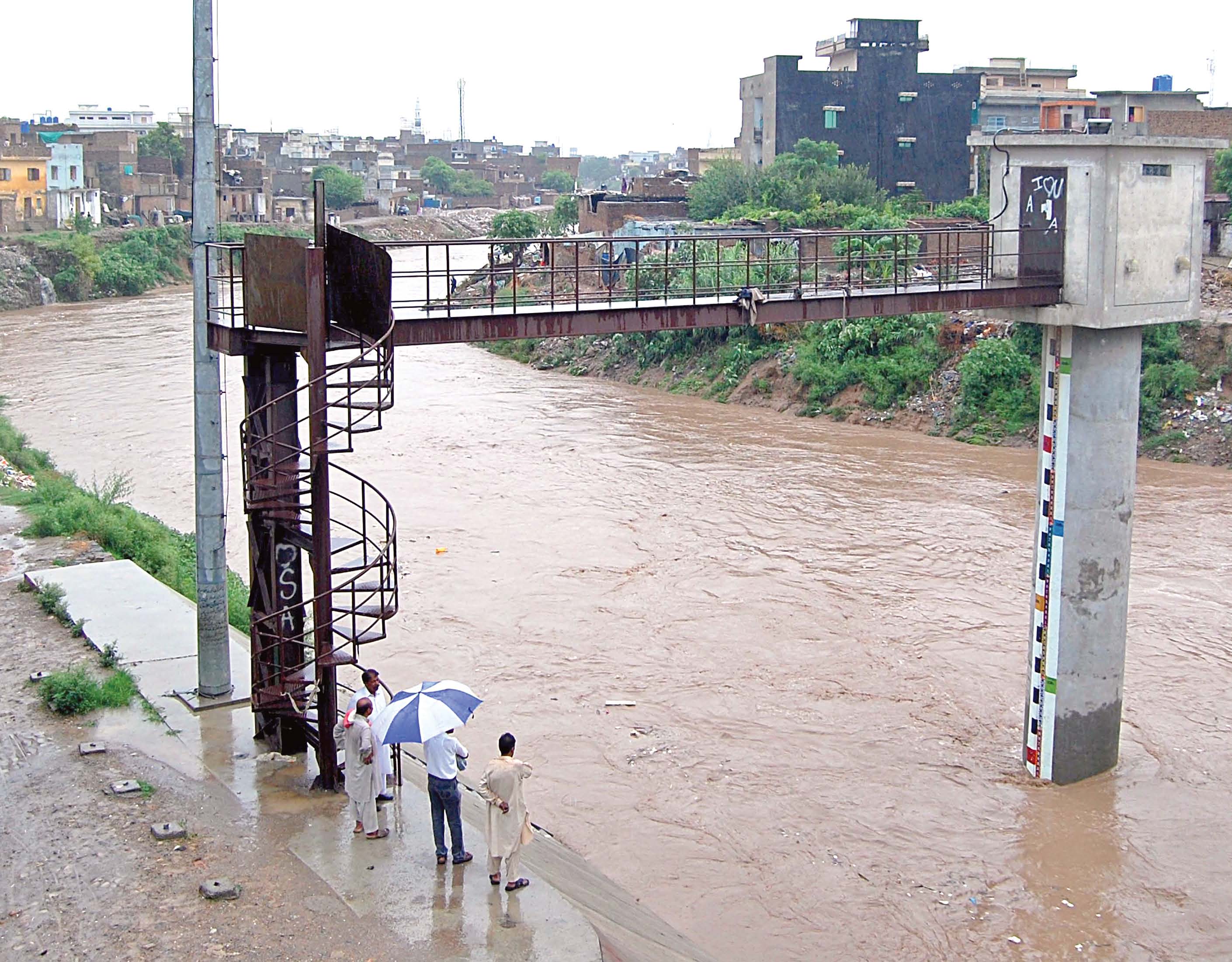 lives of locals living on the banks of the river are at risk due to the absence of the early warning system photo muhammad javaid