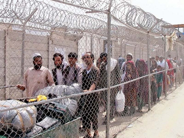 people from afghanistan enter pakistan through the torkham border which reopened on saturday photo inp people from afghanistan enter pakistan through the torkham border which reopened on saturday photo inp