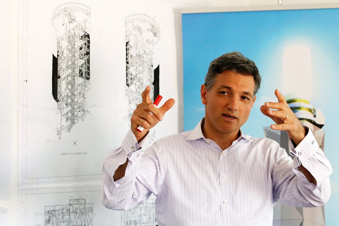 eran gartner the chief executive officer of megalim power ltd speaks with afp journalists in an office at the construction site of the ashalim solar tower near the southern israeli kibbutz of ashalim in the negev desert on may 26 2016 photo afp