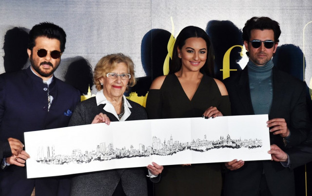 this file photo taken on march 14 2016 shows froml indian actors anil kapoor sonakshi sinha and hrithik roshan with madrid 039 s mayor manuela carmena posing with drawing of the madrid 039 s skyline after a press conference held to present the bollywood oscars in madrid on march 14 2016 madrid will host on june 25 2016 the annual international indian film academy awards dubbed the quot bollywood oscars quot in another bid to lure visitors from the world 039 s second most populous country photo afp this file photo taken on march 14 2016 shows froml indian actors anil kapoor sonakshi sinha and hrithik roshan with madrid 039 s mayor manuela carmena posing with drawing of the madrid 039 s skyline after a press conference held to present the bollywood oscars in madrid on march 14 2016 madrid will host on june 25 2016 the annual international indian film academy awards dubbed the quot bollywood oscars quot in another bid to lure visitors from the world 039 s second most populous country photo afp
