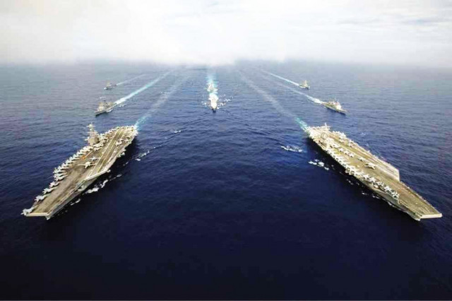 the nimitz class aircraft carriers uss john c stennis and uss ronald reagan conduct dual carrier flight operations in support of security and stability in the indo asia pacific region the activities mark the us navy s continued presence throughout the area of responsibility us navy photo the nimitz class aircraft carriers uss john c stennis and uss ronald reagan conduct dual carrier flight operations in support of security and stability in the indo asia pacific region the activities mark the us navy s continued presence throughout the area of responsibility us navy photo
