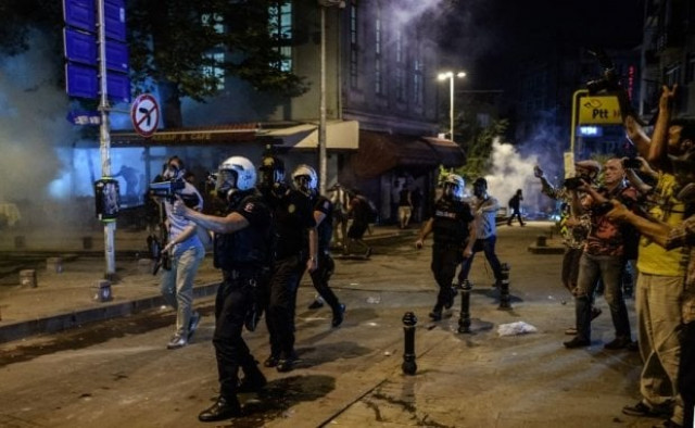 turkish anti riot police officers fire rubber bullets to disperse protestors on june 18 2016 photo afp turkish anti riot police officers fire rubber bullets to disperse protestors on june 18 2016 photo afp