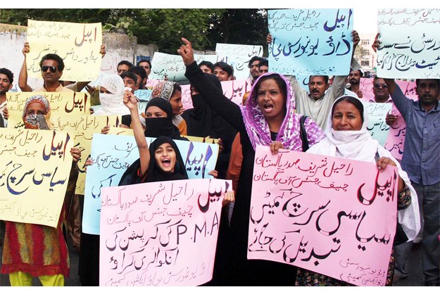 activists of civil society chant slogans during a demonstration organized by dow university bachao action committee photo online