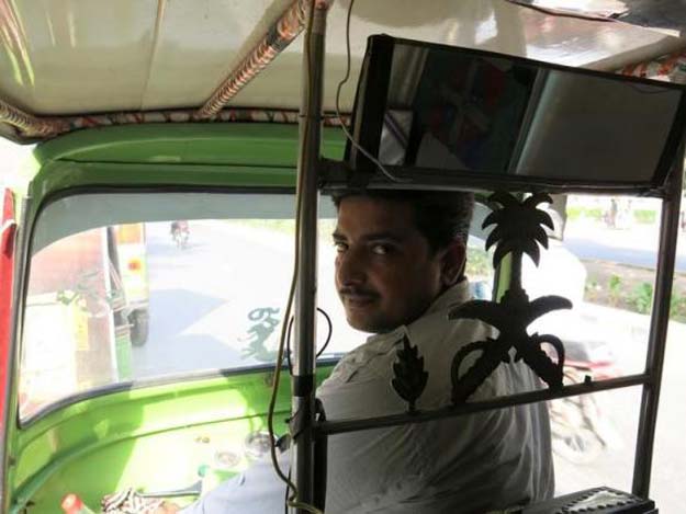 rixi rickshaw driver saeed akhtar sits in his rickshaw in lahore on may 19 2016 photo reuters