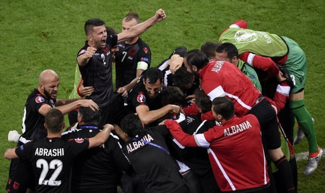 albania 039 s players celebrate the opening goal by armando sadiku at the parc olympique lyonnais stadium in lyon on june 19 2016 photo afp albania 039 s players celebrate the opening goal by armando sadiku at the parc olympique lyonnais stadium in lyon on june 19 2016 photo afp