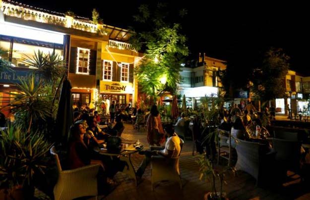 customers dine at outdoor restaurants at kohsar market in islamabad pakistan june 18 2016 photo reuters